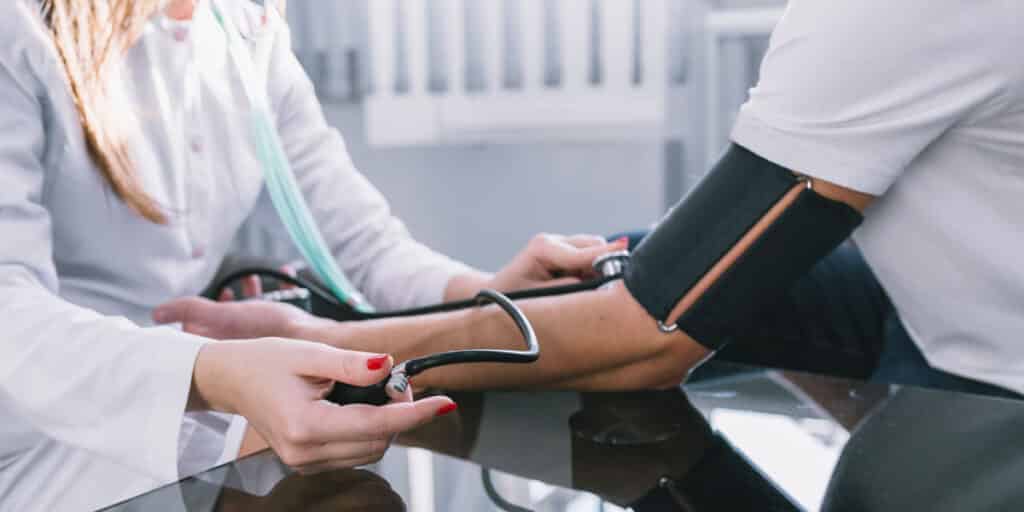 Provider using stethoscope